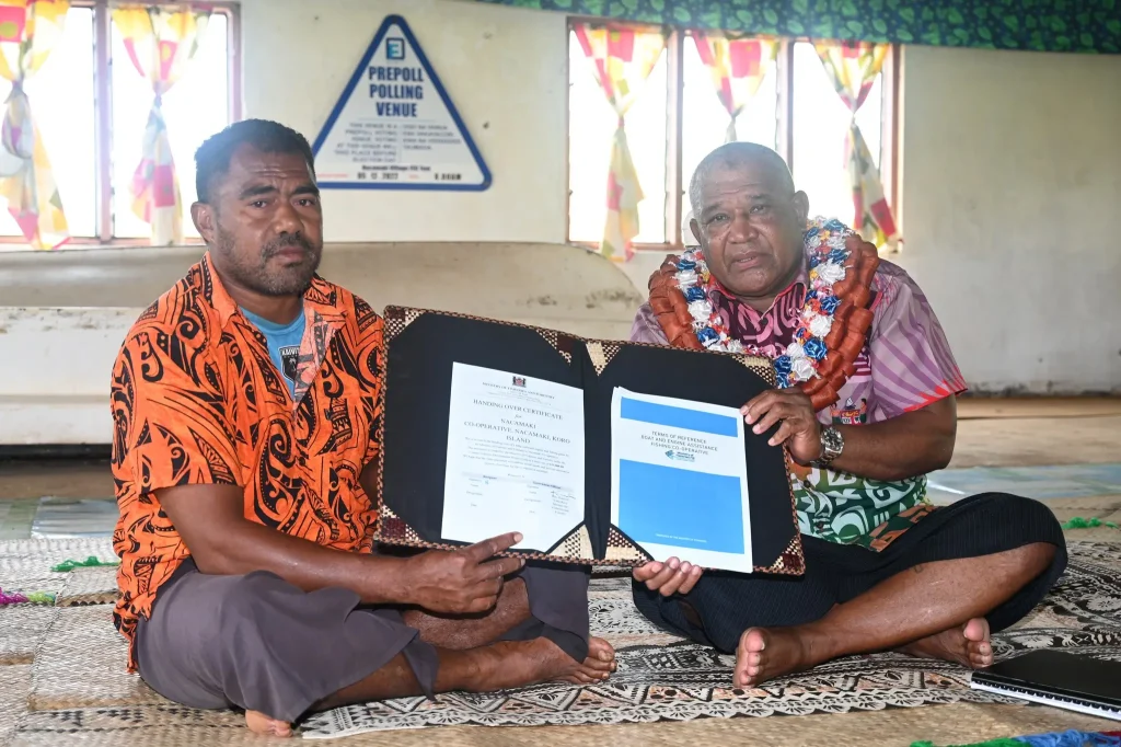 Minister for Fisheries and Forestry, Hon. Kalaveti Ravu with the Turaga-ni-Koro of Nacamaki Village, Venasio Seru.
