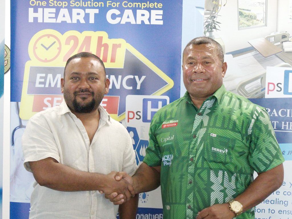 PSH Hospitals' founder and CEO Parvish Kumar, left, with brand ambassador and rugby icon Waisale Serevi in Nadi.